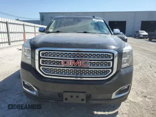 2018 GMC Yukon SLT with VIN 1GKS1BKC9JR108210, listed as a Copart auction lot 50465765 with 106,542 mi miles and Salvage Title. Bid and sale history available at carsss.com. Image 5.