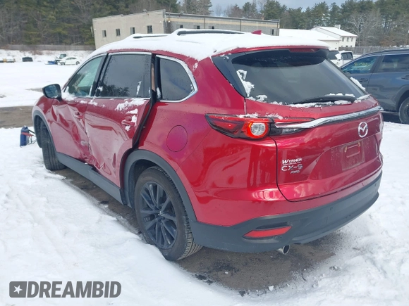 2022 Mazda CX-9 Touring Plus z VIN JM3TCBAY0N0619152, wystawiony jako IAAI lot #41489705 z przebiegiem 18 664 mil mil oraz . Historia ofert i sprzedaży dostępna na DreamBid. Obrazek 3.
