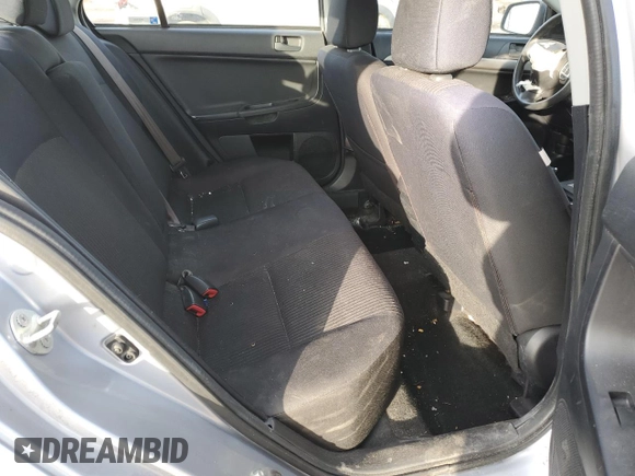 2014 Mitsubishi Lancer SE z VIN JA32V2FW4EU013379, wystawiony jako Copart lot #44632655 z przebiegiem 108 599 mil mil oraz Szkoda całkowita • Salvage title. Historia ofert i sprzedaży dostępna na DreamBid. Obrazek 11.