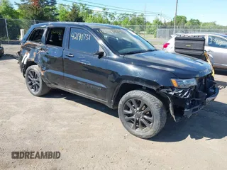 2018 Jeep Grand Cherokee Altitude with VIN 1C4RJFAG6JC147832, listed as a IAAI auction lot 42190737 with 104,280 mi miles and . Bid and sale history available at DreamBid. Image 1.