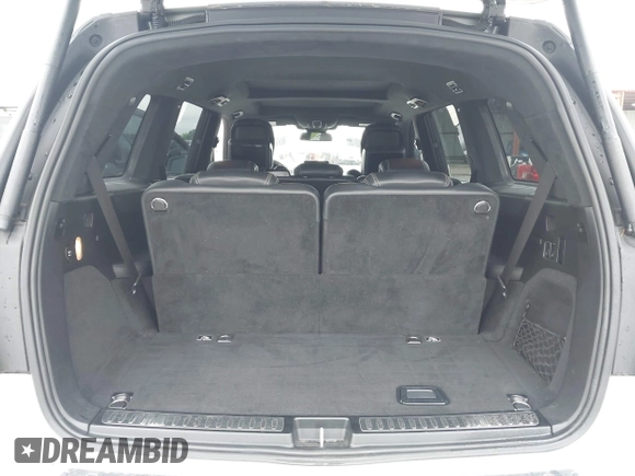 2018 Mercedes-Benz GLS 63 AMG with VIN 4JGDF7FE1JB099084, listed as a IAAI auction lot 42220385 with 97,904 mi miles and . Bid and sale history available at DreamBid. Image 17.