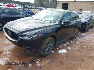 2020 Mazda CX-5 Touring z VIN JM3KFBCMXL1741182, wystawiony jako IAAI lot #41602315 z przebiegiem 31 582 mil mil oraz . Historia ofert i sprzedaży dostępna na DreamBid. Obrazek 18.