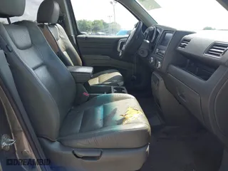 2007 Honda Ridgeline RTL w/Leather with VIN 2HJYK16527H547522, listed as a IAAI auction lot 41939603 with 127,899 mi miles. Bid and sale history available at carsss.com. Image 5.