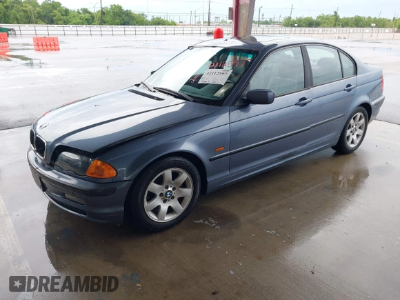 2000 BMW 3 Series 323i with VIN WBAAM334XYCB24411, listed as a IAAI auction lot 42112597 with 94,813 mi miles and . Bid and sale history available at carsss.com. Image 2.
