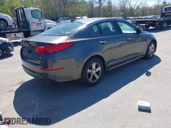 2015 Kia Optima LX with VIN 5XXGM4A74FG396236, listed as a IAAI auction lot 42165862 with 127,383 mi miles. Bid and sale history available at carsss.com. Image 4.