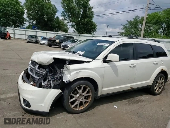 2012 Dodge Journey SXT with VIN 3C4PDCCG4CT243492, listed as a Copart auction lot 59908485 with 319,175 mi miles and Salvage title. Bid and sale history available at DreamBid. Image 14.