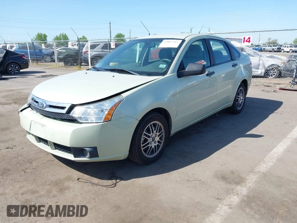 2011 Ford Focus SE with VIN 1FAHP3FN9BW167286, listed as a IAAI auction lot 42087263 with 71,923 mi miles. Bid and sale history available at carsss.com. Image 2.