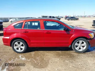 2010 Dodge Caliber SXT with VIN 1B3CB4HA9AD530250, listed as a IAAI auction lot 41624270 with 148,003 mi miles and . Bid and sale history available at DreamBid. Image 14.