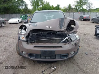 2014 MINI Countryman S with VIN WMWZC5C55EWP41717, listed as a IAAI auction lot 42324347 with Not provided miles and . Bid and sale history available at DreamBid. Image 13.