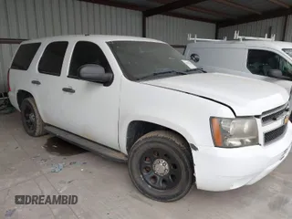 2013 Chevrolet Tahoe Commercial z VIN 1GNLC2E00DR373153, wystawiony jako IAAI lot #41889149 z przebiegiem 91 583 mil mil oraz . Historia ofert i sprzedaży dostępna na DreamBid. Obrazek 1.