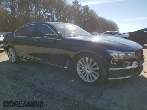 2017 BMW 7 Series 740i xDrive with VIN WBA7E4C5XHGU99338, listed as a Copart auction lot 39952414 with 51,938 mi miles. Bid and sale history available at carsss.com. Image 4.