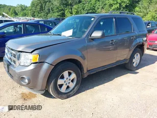 2012 Ford Escape XLT z VIN 1FMCU9DG7CKB28270, wystawiony jako IAAI lot #42607520 z przebiegiem 129 758 mil mil oraz . Historia ofert i sprzedaży dostępna na DreamBid. Obrazek 2.