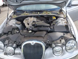 2003 Jaguar S-Type with VIN SAJEA01T83FM48713, listed as a IAAI auction lot 41402152 with 142,875 mi miles and . Bid and sale history available at DreamBid. Image 10.