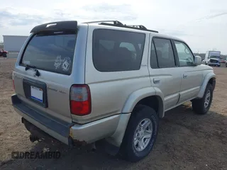 1999 Toyota 4Runner Limited z VIN JT3HN87R0X9024980, wystawiony jako IAAI lot #42128748 z przebiegiem 290 613 mil mil oraz . Historia ofert i sprzedaży dostępna na DreamBid. Obrazek 4.