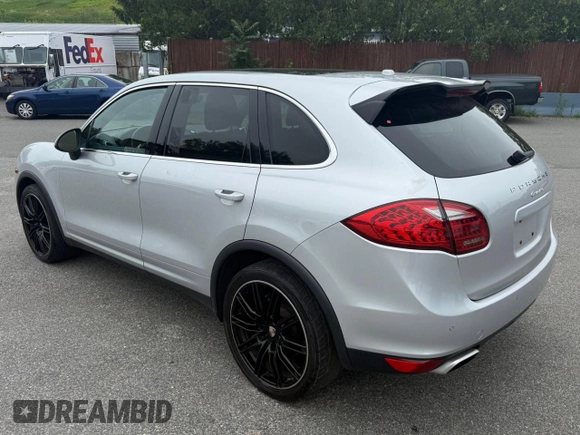 2012 Porsche Cayenne z VIN WP1AA2A23CLA09161, wystawiony jako Copart lot #60892115 z przebiegiem 168 458 mil mil oraz Czysty tytuł • Clean title. Historia ofert i sprzedaży dostępna na DreamBid. Obrazek 3.