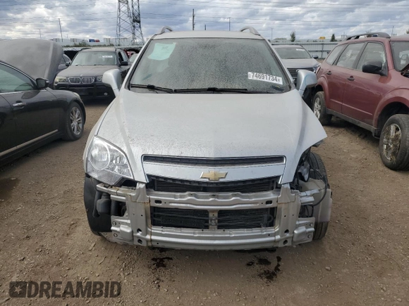 2014 Chevrolet Captiva Sport LT with VIN 3GNAL3EK9ES640609, listed as a Copart auction lot 74691734 with 150,482 mi miles and Salvage Title. Bid and sale history available at DreamBid. Image 5.