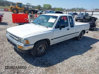 1989 Toyota Pickup z VIN JT4VN93D7K0002714, wystawiony jako IAAI lot #41971990 z przebiegiem 251 337 mil mil oraz . Historia ofert i sprzedaży dostępna na DreamBid. Obrazek 2.