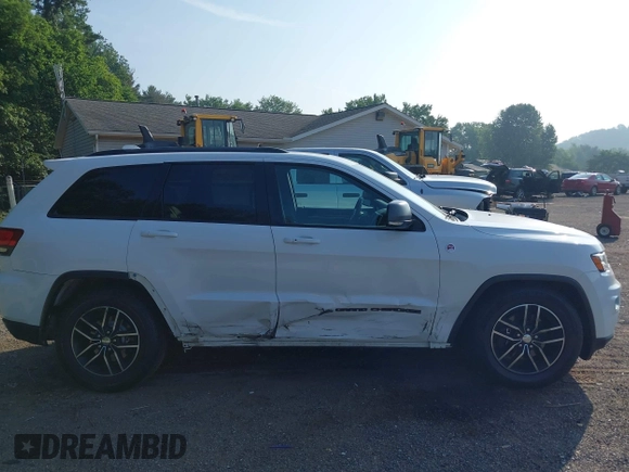 2017 Jeep Grand Cherokee Trailhawk with VIN 1C4RJFLG2HC670868, listed as a IAAI auction lot 42711041 with 129,465 mi miles and . Bid and sale history available at DreamBid. Image 13.