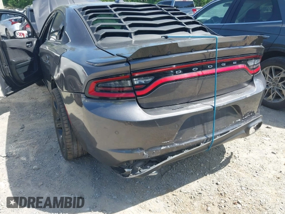 2018 Dodge Charger Daytona z VIN 2C3CDXCT4JH261021, wystawiony jako IAAI lot #42188904 z przebiegiem 79 652 mil mil oraz . Historia ofert i sprzedaży dostępna na DreamBid. Obrazek 6.
