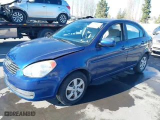 2011 Hyundai Accent GLS with VIN KMHCN4ACXBU609229, listed as a IAAI auction lot 41406971 with 94,464 mi miles. Bid and sale history available at carsss.com. Image 2.