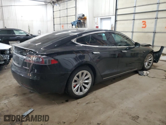 2019 Tesla Model S 100D с VIN 5YJSA1E46KF332553, выставлен на аукционе Copart как лот 41532825 с пробегом 131 073 миль миль и Списание • Salvage title. История ставок и продаж доступна на DreamBid. Изображение 3.
