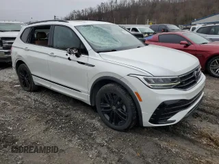 2022 Volkswagen Tiguan SE R-Line Black with VIN 3VV8B7AX8NM072183, listed as a Copart auction lot 42331045 with 87,387 mi miles and Salvage Title. Bid and sale history available at DreamBid. Image 4.
