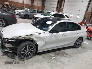 2019 BMW 3 Series 330i xDrive with VIN WBA5R7C55KAJ83482, listed as a IAAI auction lot 41565321 with 126,536 mi miles. Bid and sale history available at carsss.com. Image 14.