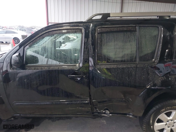 2011 Nissan Pathfinder LE with VIN 5N1AR1NB8BC633188, listed as a IAAI auction lot 41608356 with 128,377 mi miles. Bid and sale history available at carsss.com. Image 14.