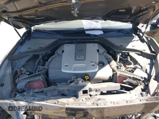 2015 Infiniti Q50 Premium with VIN JN1BV7AP9FM348009, listed as a IAAI auction lot 41852281 with 124,118 mi miles. Bid and sale history available at carsss.com. Image 10.