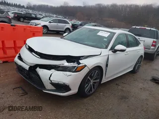 2023 Honda Civic Touring z VIN 2HGFE1F93PH304731, wystawiony jako IAAI lot #41675935 z przebiegiem 27 435 mil mil oraz . Historia ofert i sprzedaży dostępna na DreamBid. Obrazek 17.