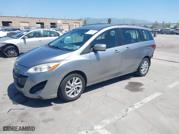 2012 Mazda Mazda5 Sport with VIN JM1CW2BL4C0103408, listed as a IAAI auction lot 42087883 with 219,601 mi miles. Bid and sale history available at carsss.com. Image 2.