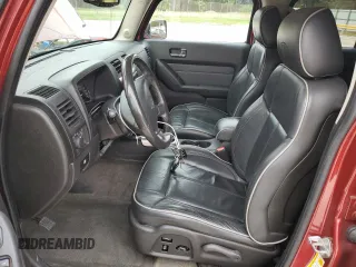 2010 Hummer H3 with VIN 5GTMNLEP0A8140183, listed as a Copart auction lot 77991624 with 148,563 mi miles and Clean Title. Bid and sale history available at DreamBid. Image 7.