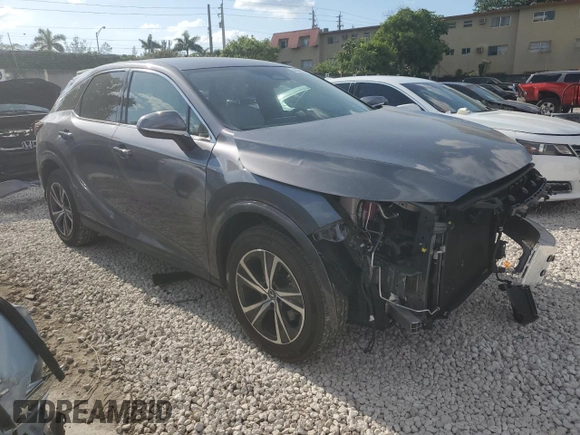 2023 Lexus RX with VIN 2T2BAMBA6PC007114, listed as a Copart auction lot 52264274 with 10,728 mi miles and Salvage Title. Bid and sale history available at carsss.com. Image 4.