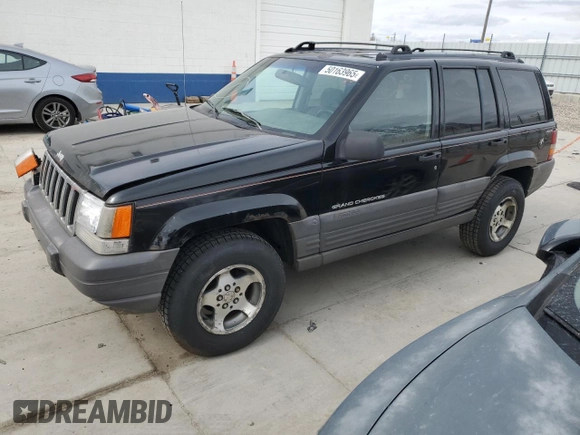 1996 Jeep Grand Cherokee with VIN 1J4EZ58S8TC106529, listed as a Copart auction lot 50163965 with 226,951 mi miles and Salvage title. Bid and sale history available at DreamBid. Image 1.