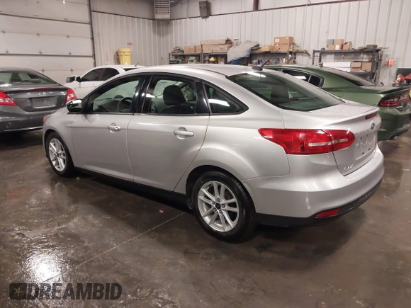 2015 Ford Focus SE with VIN 1FADP3F28FL357382, listed as a IAAI auction lot 41223441 with 47,682 mi miles. Bid and sale history available at carsss.com. Image 3.