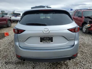 2021 Mazda CX-5 Grand Touring with VIN JM3KFBDM1M1403699, listed as a Copart auction lot 49888655 with 29,919 mi miles and Salvage Title. Bid and sale history available at carsss.com. Image 6.