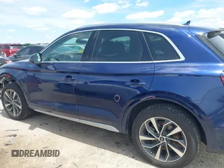 2021 Audi Q5 Premium with VIN WA1AAAFY7M2004975, listed as a IAAI auction lot 42190283 with 56,810 mi miles and . Bid and sale history available at DreamBid. Image 14.