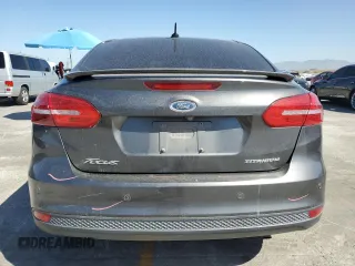 2017 Ford Focus Titanium with VIN 1FADP3J22HL279854, listed as a Copart auction lot 61209135 with 106,323 mi miles and Salvage title. Bid and sale history available at DreamBid. Image 6.