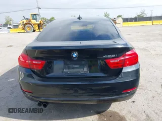 2015 BMW 4 Series 428i z VIN WBA4A9C5XFD416873, wystawiony jako IAAI lot #42108645 z przebiegiem 93 433 mil mil oraz . Historia ofert i sprzedaży dostępna na DreamBid. Obrazek 17.