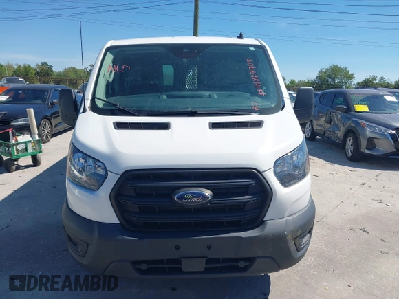 2020 Ford Transit Cargo z VIN 1FTBR1Y8XLKB35493, wystawiony jako IAAI lot #41887907 z przebiegiem 95 858 mil mil oraz . Historia ofert i sprzedaży dostępna na DreamBid. Obrazek 12.