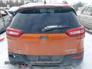 2015 Jeep Cherokee Trailhawk with VIN 1C4PJMBS9FW655233, listed as a IAAI auction lot 41430715 with 138,181 mi miles and . Bid and sale history available at carsss.com. Image 17.