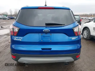 2017 Ford Escape Titanium with VIN 1FMCU9JD8HUA59000, listed as a IAAI auction lot 41559788 with 90,319 mi miles. Bid and sale history available at carsss.com. Image 16.