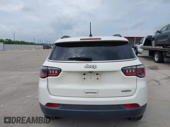 2019 Jeep Compass Latitude with VIN 3C4NJCBB9KT652088, listed as a IAAI auction lot 42162439 with 97,276 mi miles and . Bid and sale history available at DreamBid. Image 16.