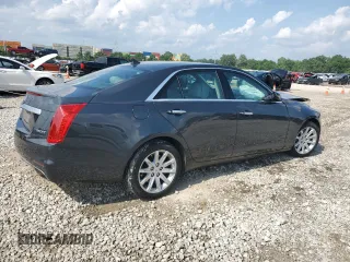 2014 Cadillac CTS AWD with VIN 1G6AW5SX9E0133215, listed as a Copart auction lot 61052055 with 179,614 mi miles and Salvage title. Bid and sale history available at DreamBid. Image 3.