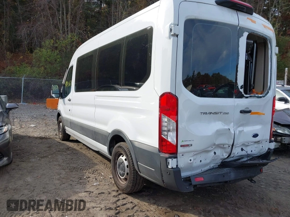 2023 Ford Transit Cargo with VIN 1FTBR1C86PKA52494, listed as a IAAI auction lot 40740671 with 9,999 mi miles and . Bid and sale history available at DreamBid. Image 3.