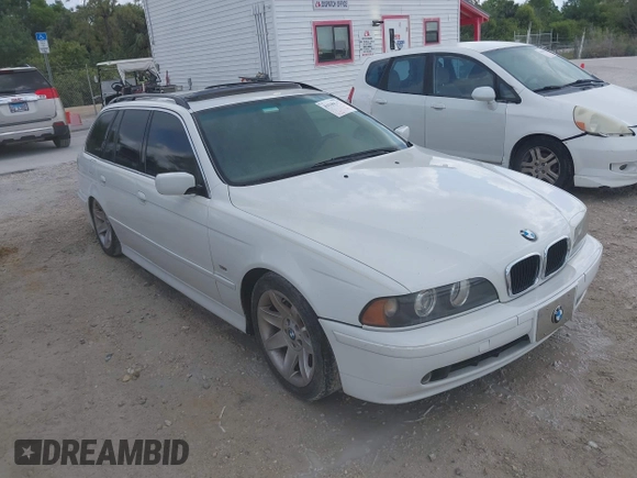 2002 BMW 5 Series 525iAT with VIN WBADS43482GD86937, listed as a IAAI auction lot 41940547 with 196,458 mi miles. Bid and sale history available at carsss.com. Image 1.