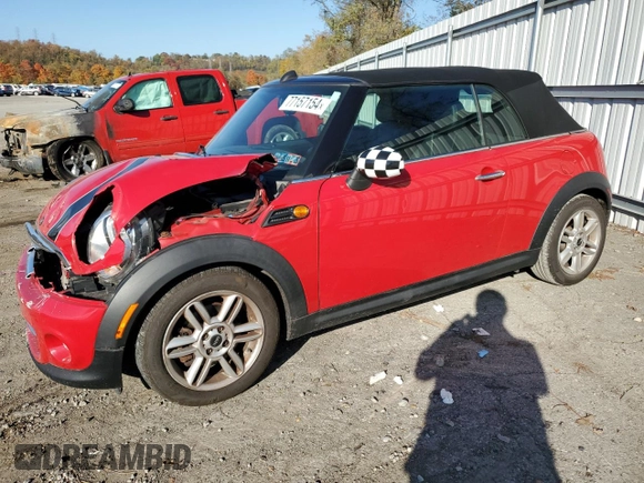 2013 MINI Convertible with VIN WMWZN3C58DT265980, listed as a Copart auction lot 77157154 with 88,975 mi miles and Salvage title. Bid and sale history available at DreamBid. Image 1.