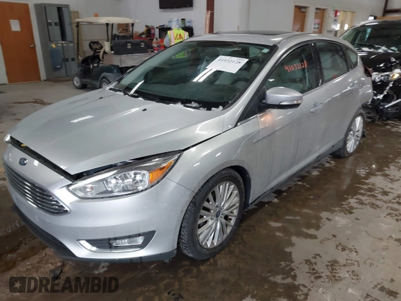 2018 Ford Focus Titanium with VIN 1FADP3N25JL261736, listed as a IAAI auction lot 41032128 with 59,142 mi miles and . Bid and sale history available at DreamBid. Image 17.