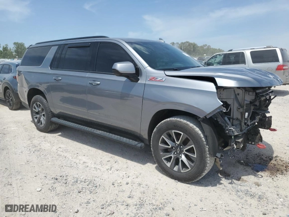 2022 Chevrolet Suburban Z71 with VIN 1GNSKDKD3NR148101, listed as a Copart auction lot 52329935 with 123,112 mi miles and Salvage Title. Bid and sale history available at carsss.com. Image 4.