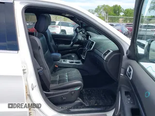 2014 Jeep Grand Cherokee Summit with VIN 1C4RJFJG0EC174871, listed as a IAAI auction lot 42341312 with 170,743 mi miles and . Bid and sale history available at DreamBid. Image 5.